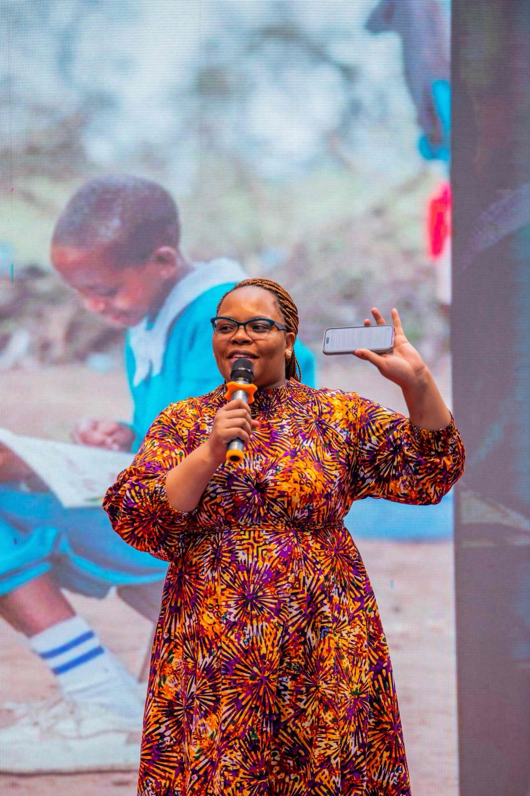 Woman speaking passionately at a community event